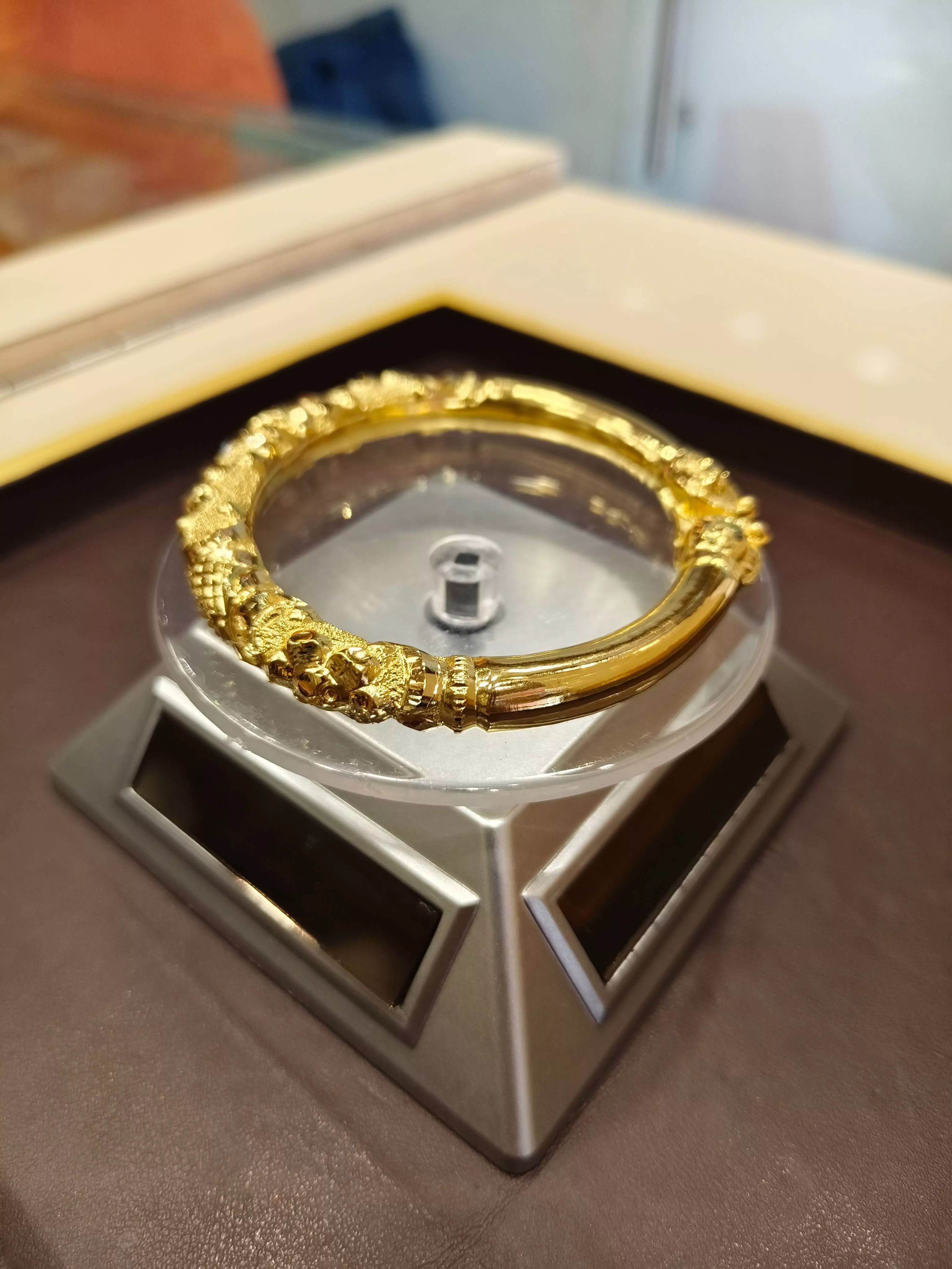 Gold Floral Pattern Bangle crafted with intricate floral designs, showcasing luxury and elegance, available at SHIV GOURI JEW