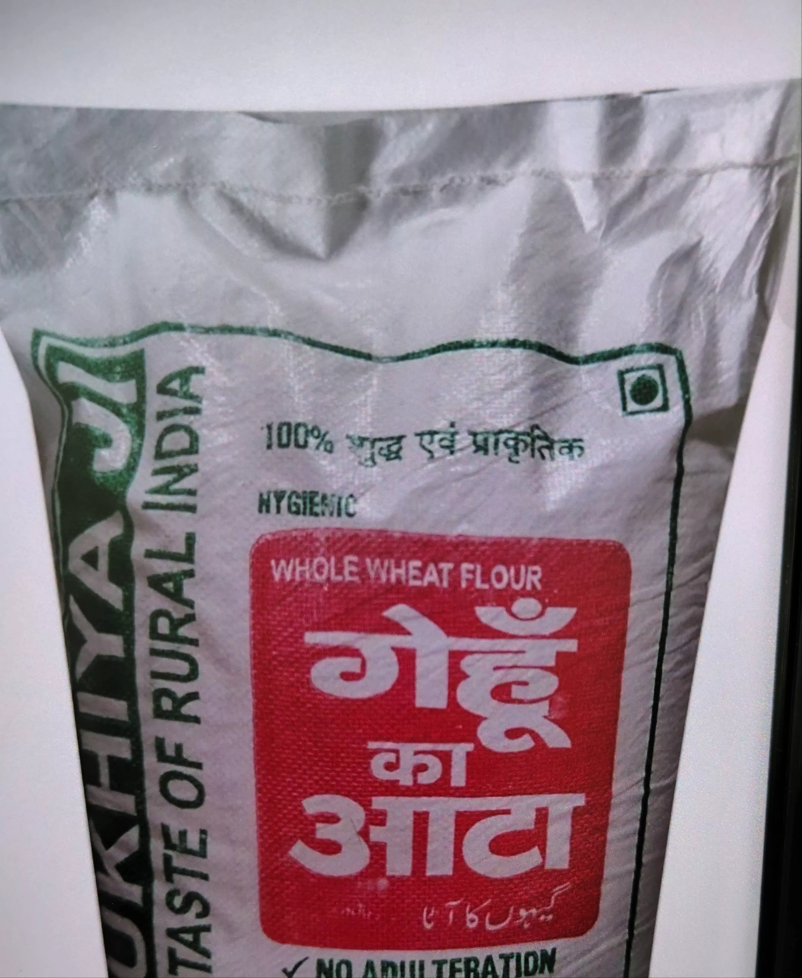 High-quality Aata for home cooking from RADHA KRISHAN FLOUR MILL, KHURJA - a fine, light-colored flour ideal for making chapa
