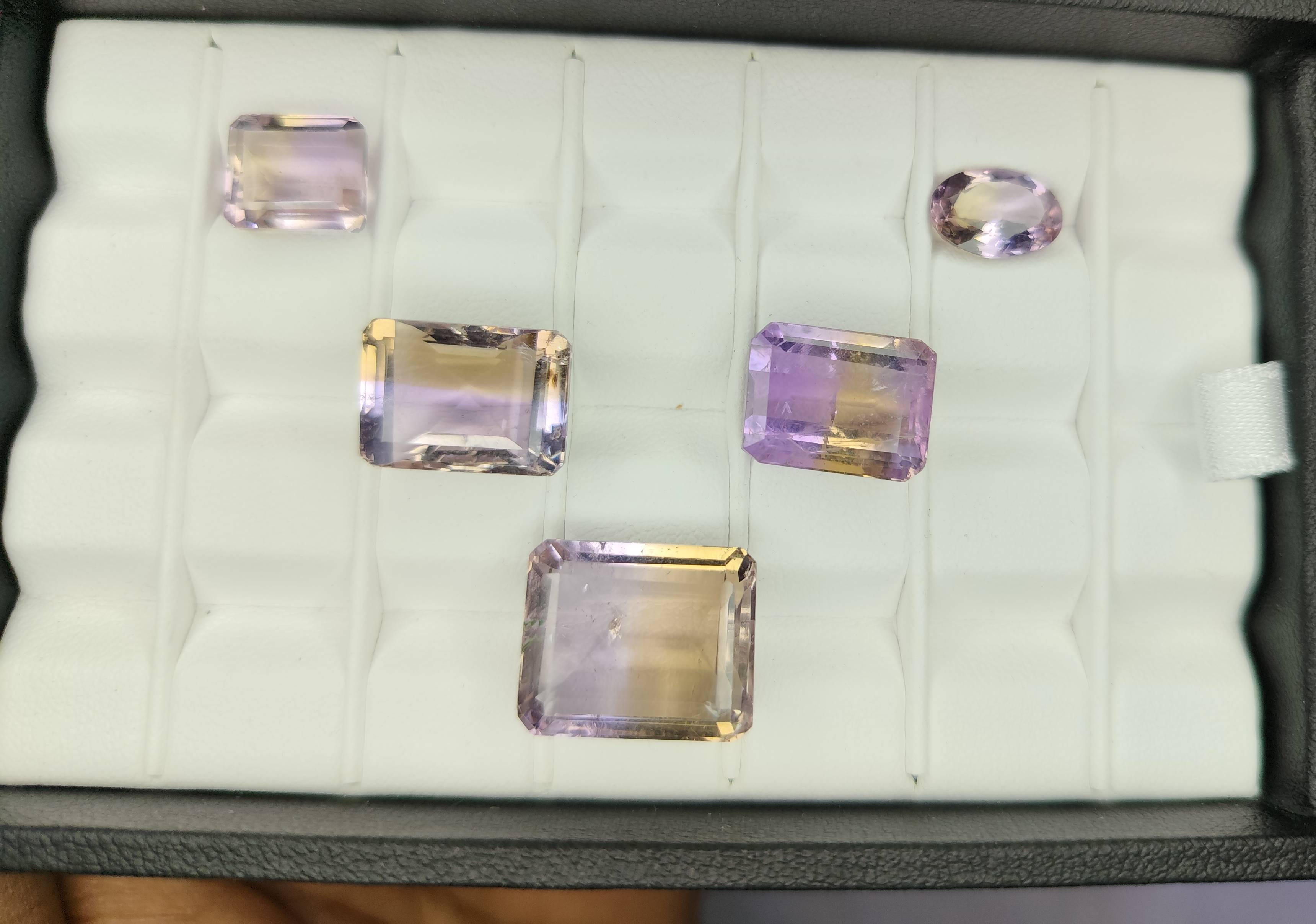 Elegant Ametrine Gemstones Jewelry featuring customizable gold or silver settings available at AYEZA GEMS in Alipura. - Image 1
