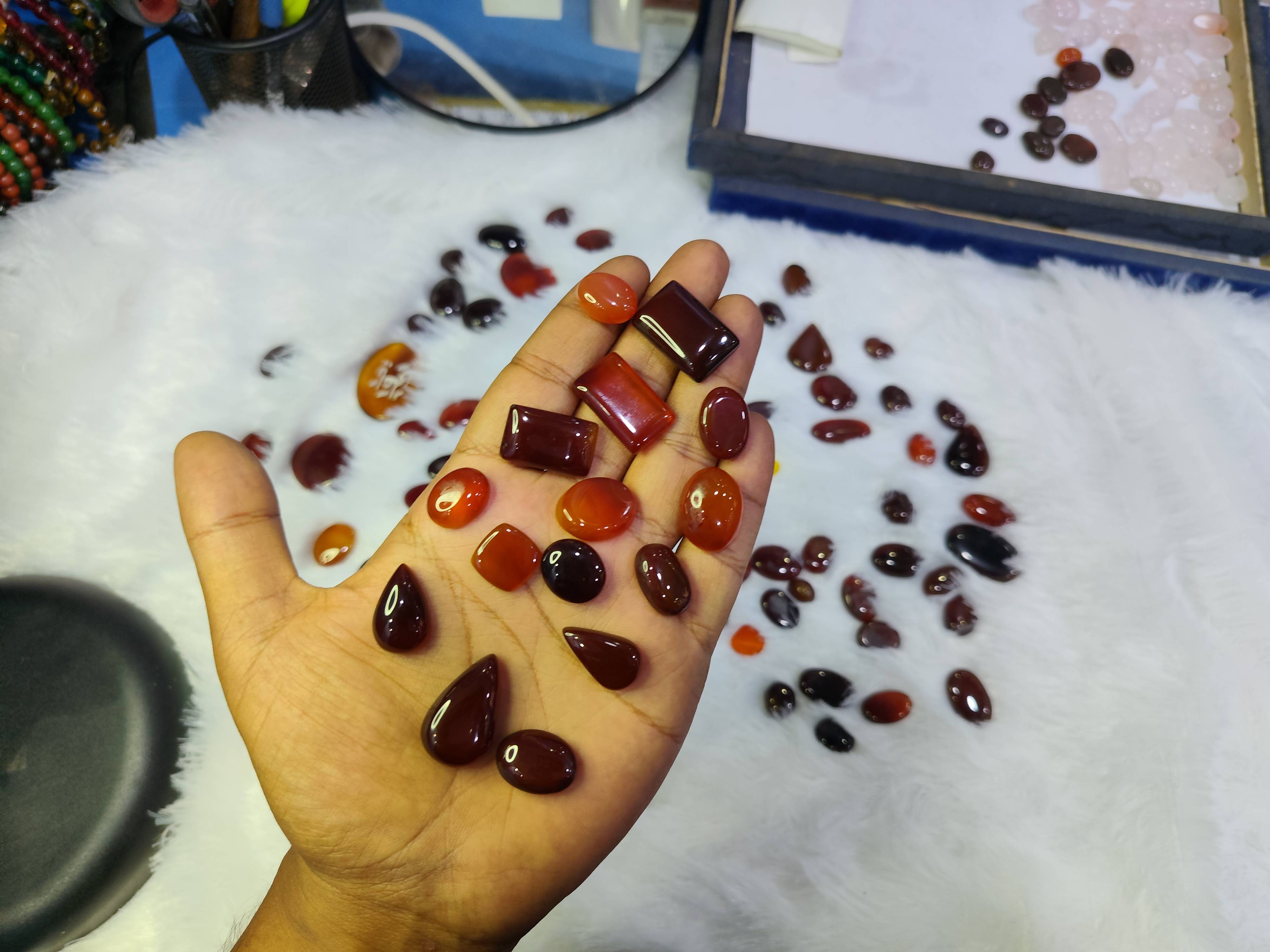 Natural Haqeeq gemstones from AYEZA GEMS displayed in Alipura, featuring vibrant colors and unique textures that promote stre - Image 3