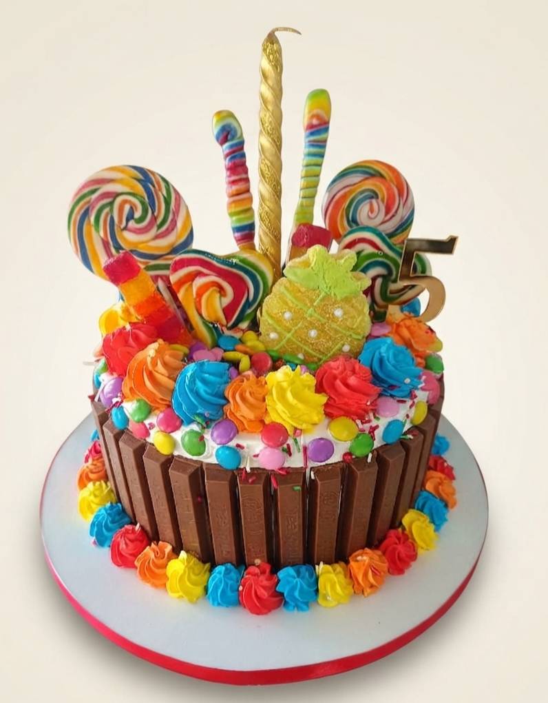  Rainbow Candy Chocolate Cake in Bangalore VARNIKA PATISSERIE HOUSE NO 570 571 SRI RAMANAGARI NEAR BY REFCO APARTMENT MURGESHPALYA BANGALORE BANGALORE LANDMARK Near Rifco Apartment