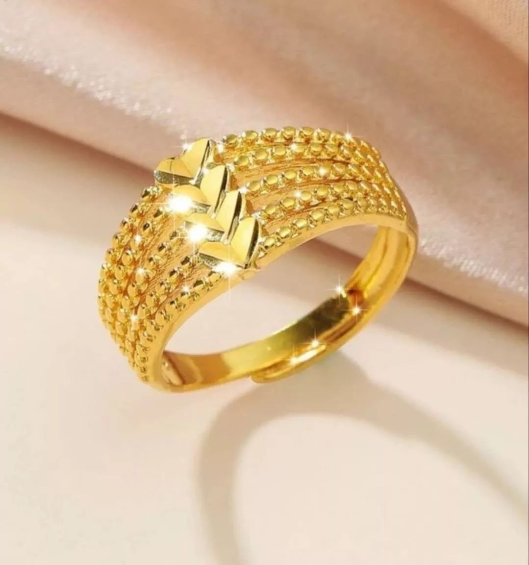 Elegant Gold Ring showcasing intricate design, Debai