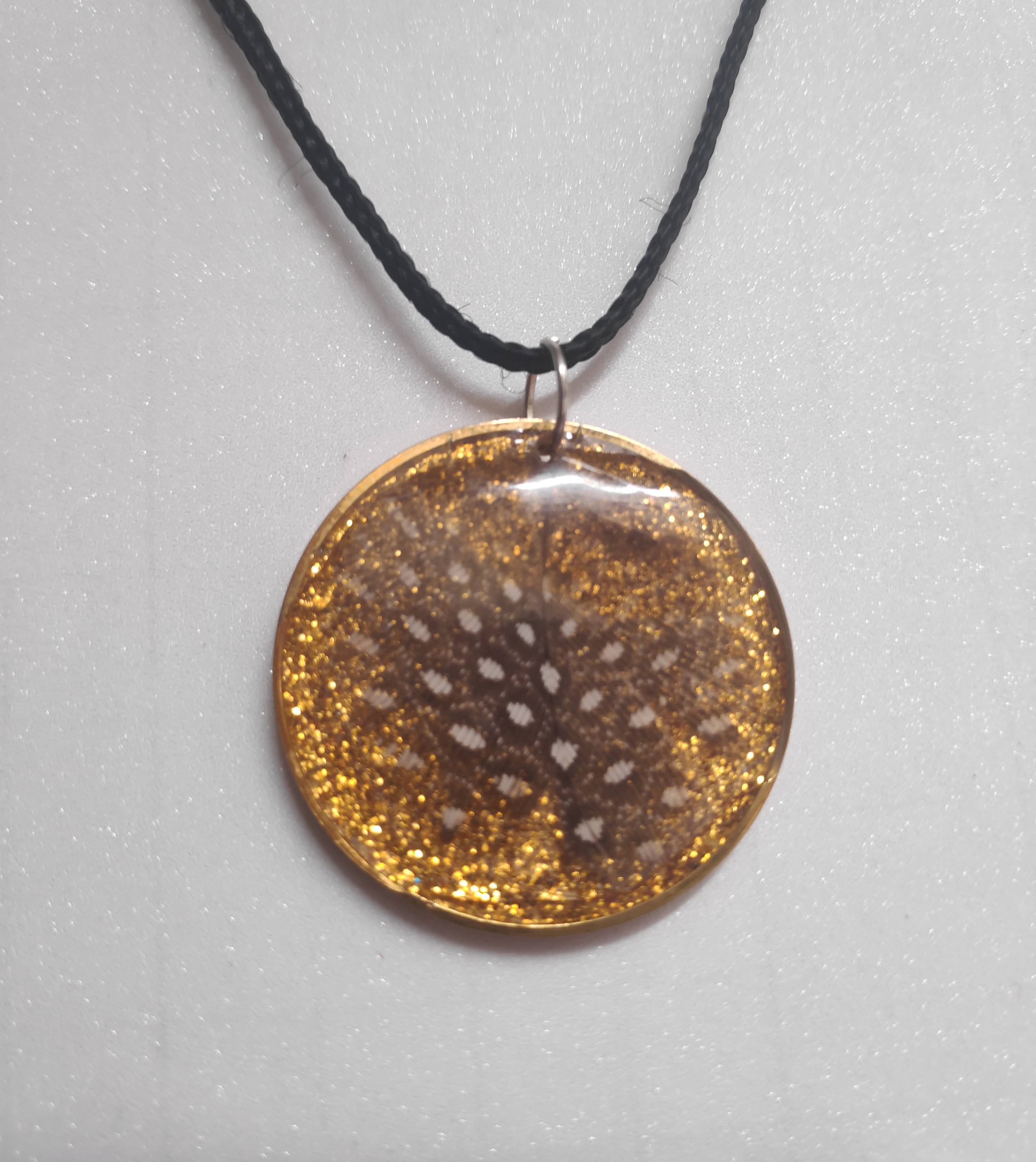Golden Glitter Resin Pendant Necklace showcasing elegant design in Bangalore
