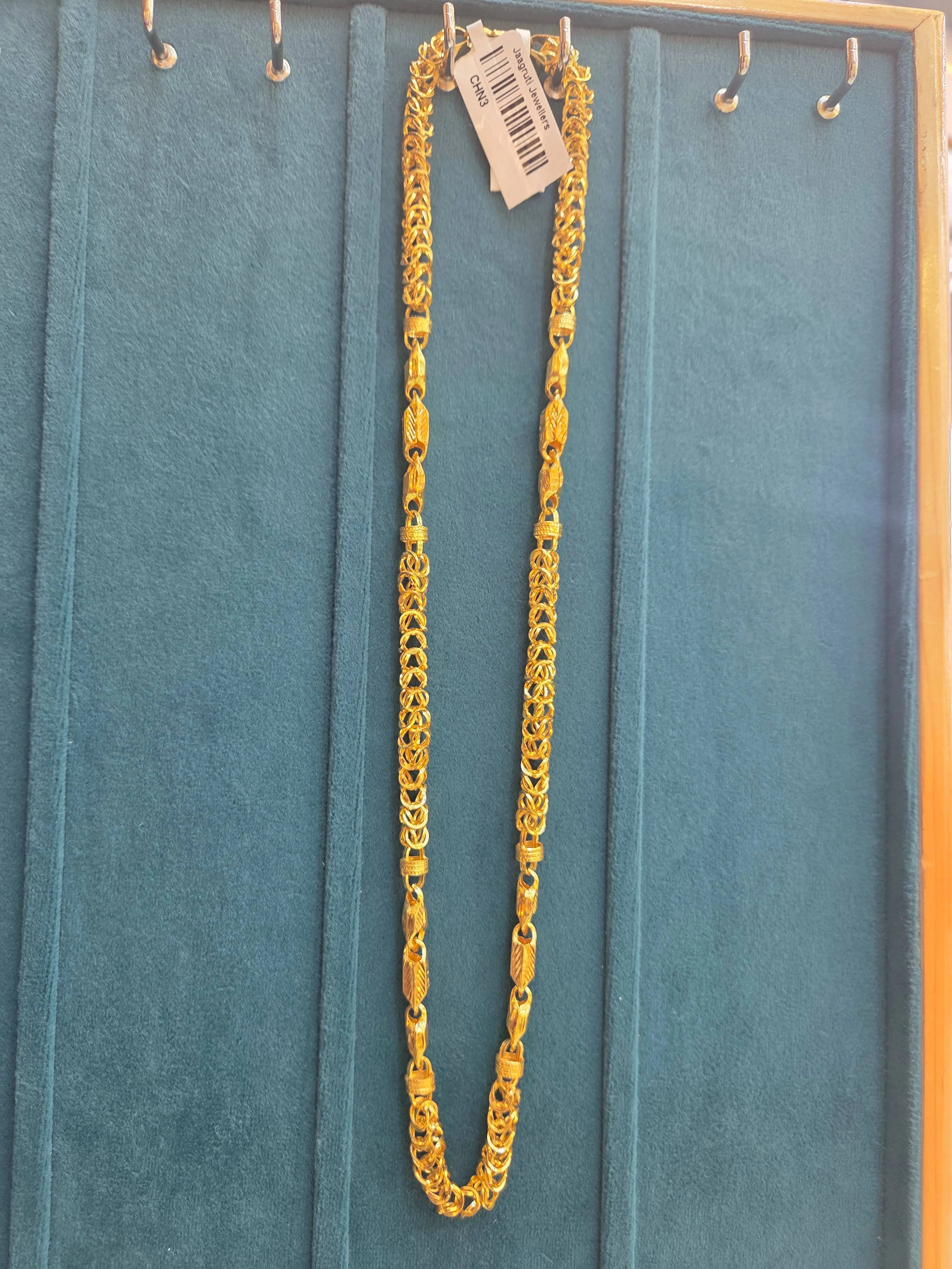 Elegant gold chain necklace designed intricately, Pune