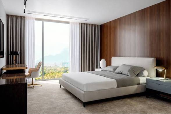 Cozy hotel room interior featuring modern amenities in Bhadrachalam