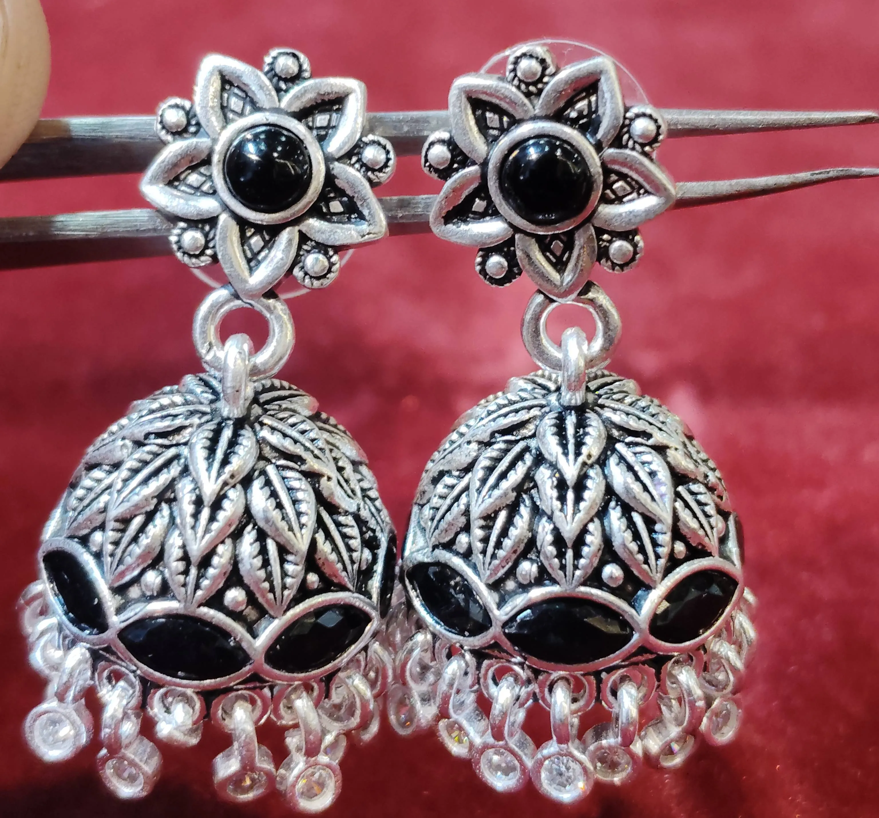Stylish Silver Jhumka Earrings displayed elegantly | Ambikapur