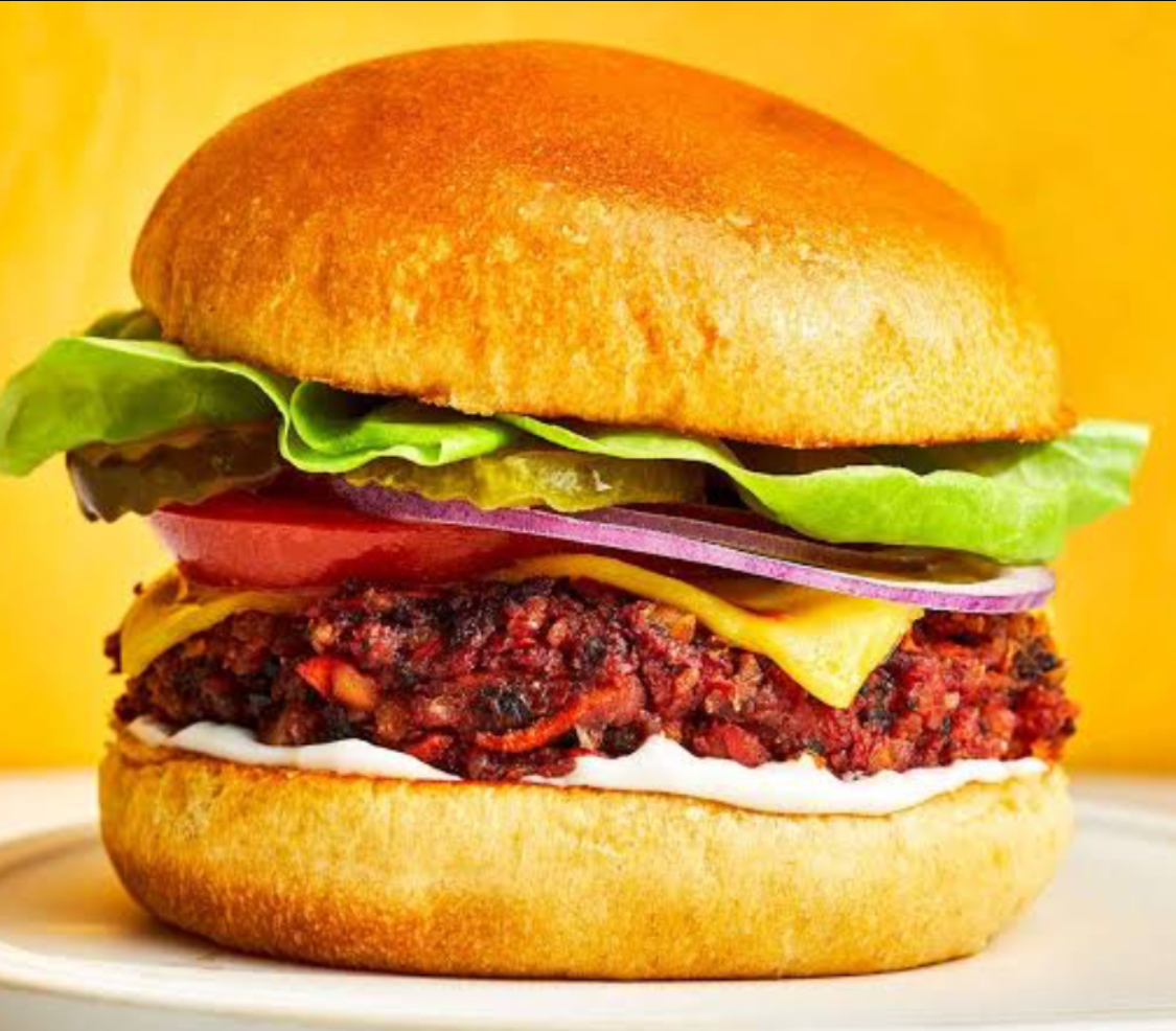Delicious OB Peppery Veg Burger served in Chamba, featuring fresh ingredients and tandoori sauce.