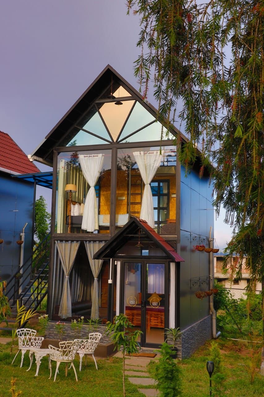 Luxurious honeymoon cottage at Chalets Resorts in Gudalur with beautiful surroundings.