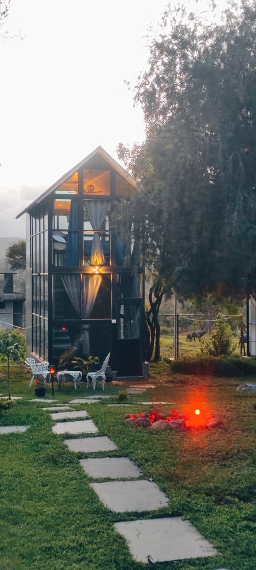 Cozy chalet accommodation at Glasshouse Retreat in Gudalur