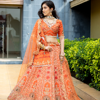RUST COLOUR DESIGNER LEHENGHA ON RENT in Surat — KAKADIYA
